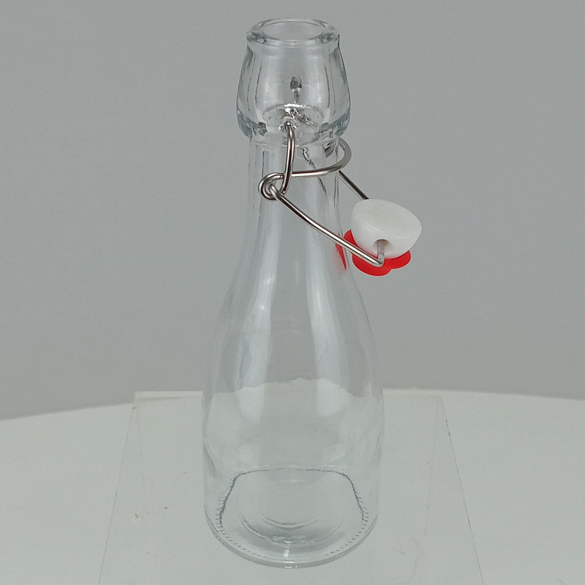 Garrafa de Vidro Transparente Home&Co 250ml com Tampa Trava 21x7x7cm