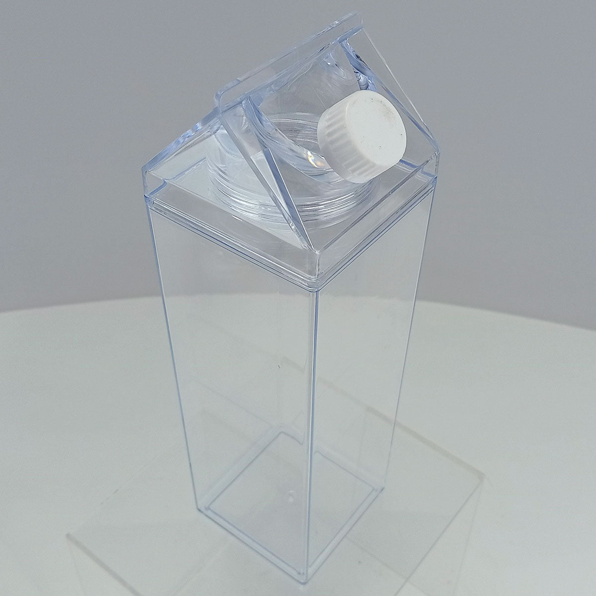 Garrafa Acrílica 1L Home&Co Transparente com Duas Tampas 26x7x7cm