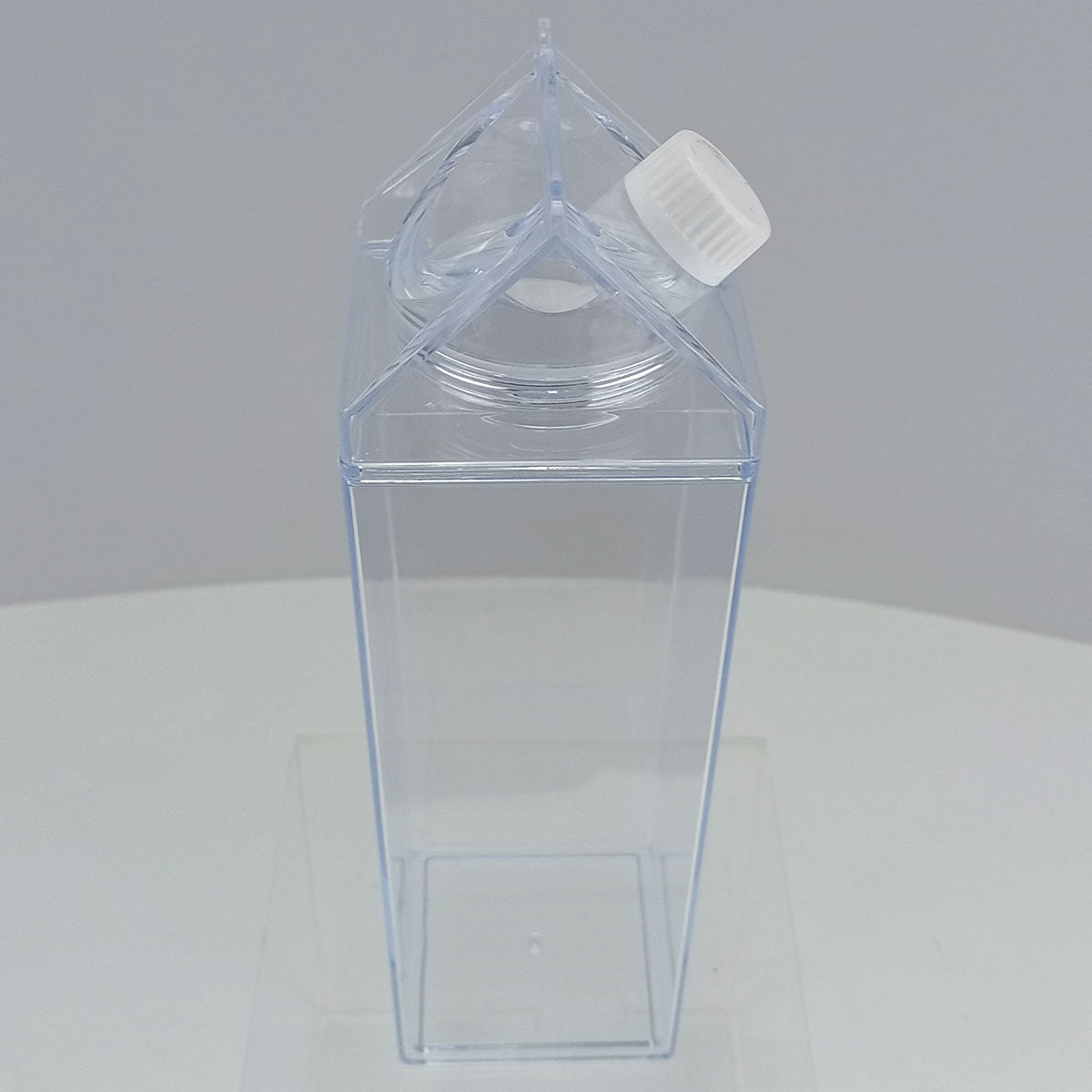 Garrafa Acrílica 1L Home&Co Transparente com Duas Tampas 26x7x7cm