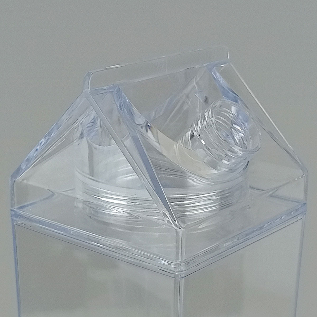 Garrafa Acrílica 1L Home&Co Transparente com Duas Tampas 26x7x7cm